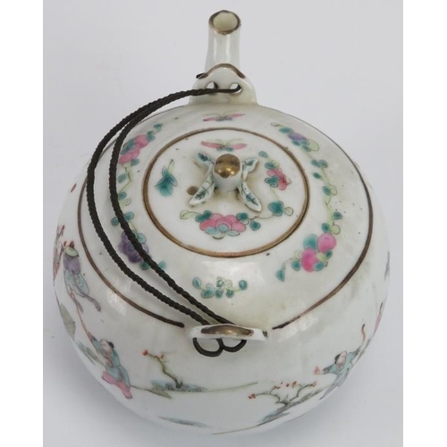 36 - A Chinese Famille Rose porcelain teapot and cover, late 19th/early 20th century. Finely painted depi... 