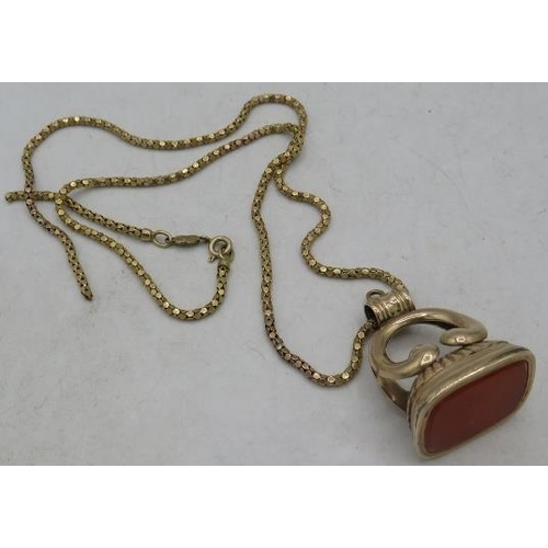 381 - A large 19th century cornelian seal on a 9ct gold chain. Chain approx 7 grams, total approx weight 3... 