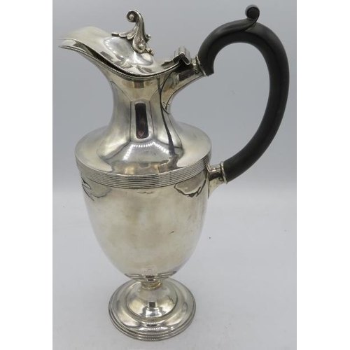 392 - A silver pedestal ewer with ebonised handle, Sheffield 1902. Approx weight 16.5 troy oz/513 grams.
C... 