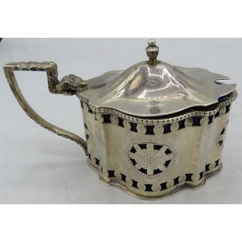 434 - A silver mustard pot in the Georgian style, Birmingham 1975, with blue liner. Approx silver weight 3... 