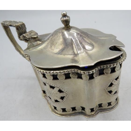 434 - A silver mustard pot in the Georgian style, Birmingham 1975, with blue liner. Approx silver weight 3... 