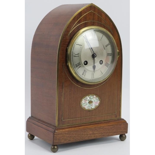 44 - A Mappin and Webb mahogany and inlaid mother of pearl Gothic arch mantel clock, circa 1900. With a R... 