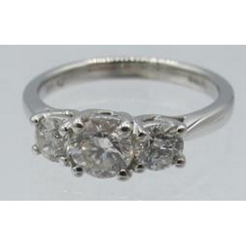 440 - A certificated 18ct white gold graduated RBC diamond trilogy ring, size L. Diamonds approx 0.98cts, ... 