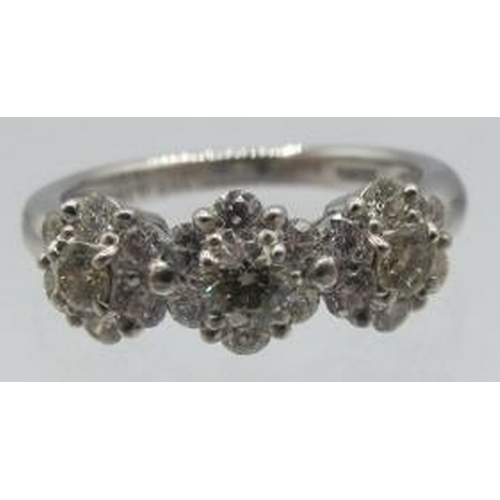 448 - An 18ct white gold daisy trilogy cluster ring set with RBC diamonds, size L. Diamonds approx 0.93cts... 