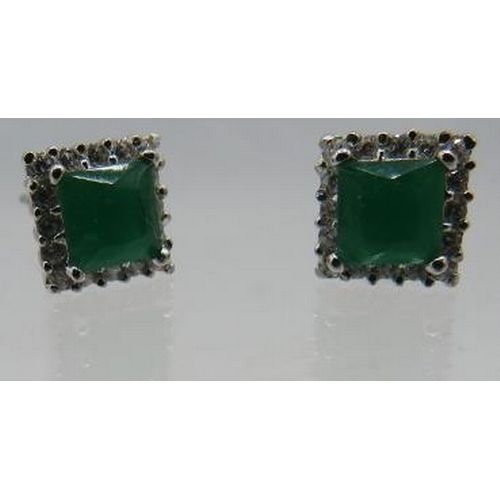 450 - A pair of 925 stamped silver square set earrings set with centre green stone & white stones. Approx ... 