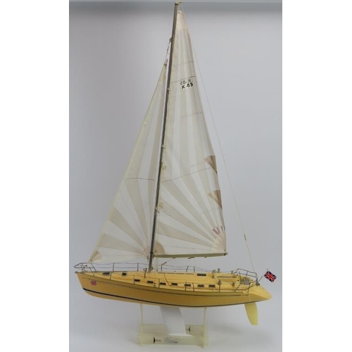 48 - A Ritual scale model a ‘Cup Yacht 650’. Mounted on a detachable stand. 109 cm height, 65 cm width.
C... 