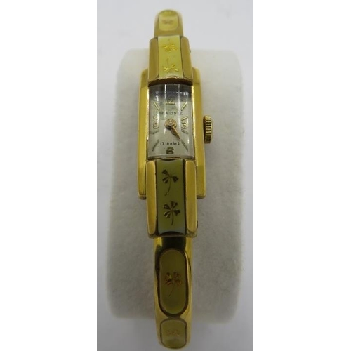 480 - A vintage Baume 17 rubies ladies wristwatch, electroplated 3000 with yellow enamelled panels set wit... 