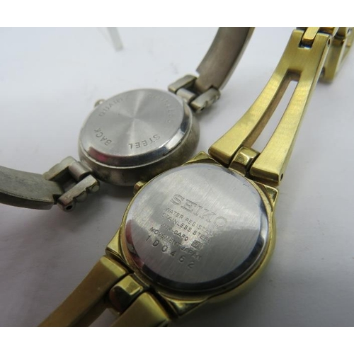 482 - A Seiko Solar V114-OAFO round gemmed case ladies wristwatch, boxed, a Hugo Buchser quartz stainless ... 