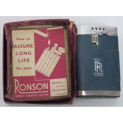 49 - A rare vintage Ronson Varaflame Roll Royce logo branded lighter. 6.1 cm height.
Condition report: So... 