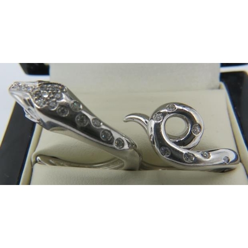 491 - A fine and unusual Boucheron 18ct white gold & 24 diamond designer snake ring. Diamonds approx 0.30c... 