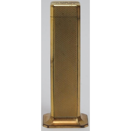 50 - A vintage Dunhill ‘Tallboy’ desktop lighter from the Swiss Open golf tournament, dated 1975. Gilt an... 