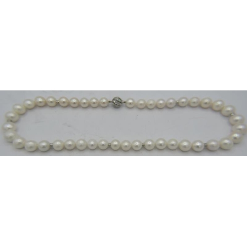 500A - An exceptionally rare strand of soft white Australian Southsea pearls with rose undertones and 8 dia... 