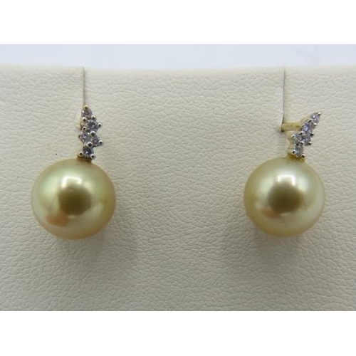 500B - An AAAA pair of 18ct yellow gold Southsea golden pearl & diamond earrings, approx 0.17cts, VS F/G, w... 