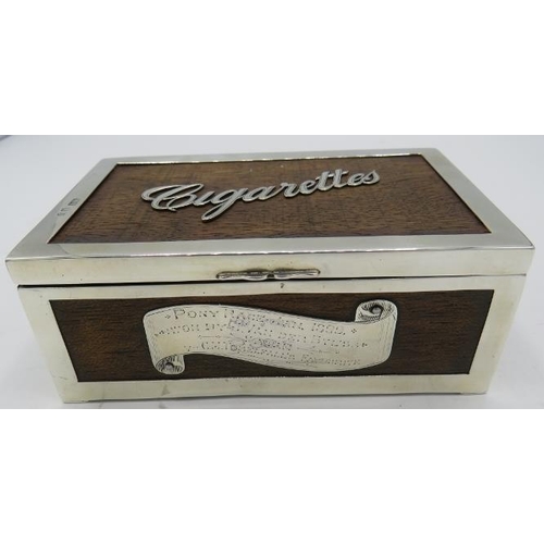 500C - A wooden cigarette box with silver edging and mounts engraved 'Pony Race Jan 1899 Won by J. Van der ... 