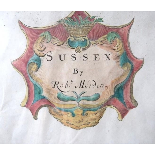 598 - An early map of Sussex by Robert Morden, C.1695. - A hand coloured, framed and glazed. Frame size: 6... 