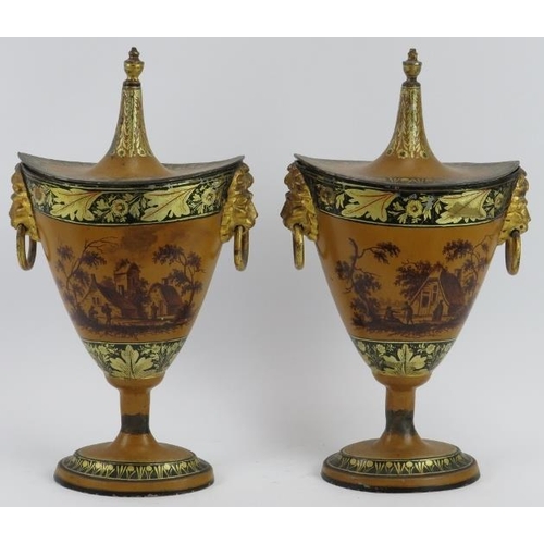 62 - A pair of Tole Peinte japanned tin chestnut urns, early 19th century. Decorated with hand painted ru... 