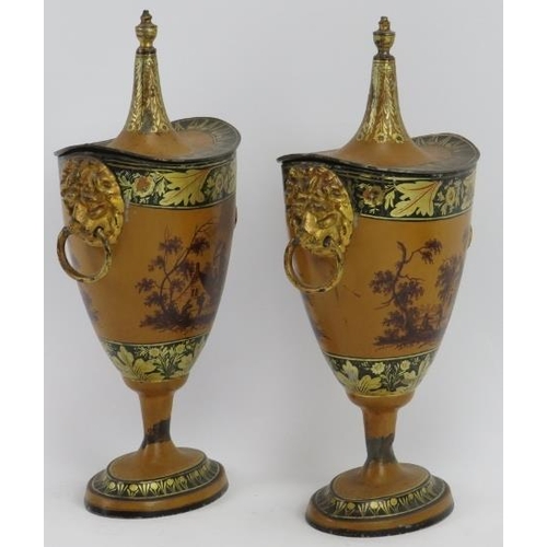 62 - A pair of Tole Peinte japanned tin chestnut urns, early 19th century. Decorated with hand painted ru... 