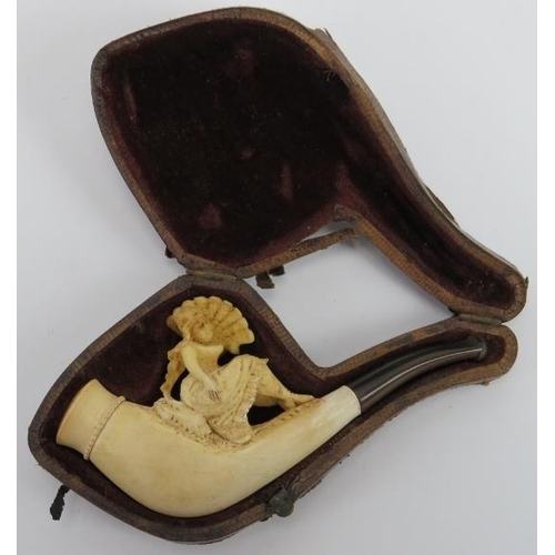 65 - A Meerschaum carved cheroot holder, 19th century. Surmounted with a lady holding a fan. 10.9 cm leng... 