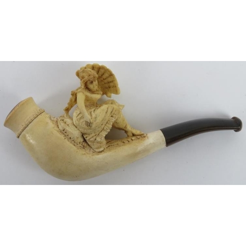 65 - A Meerschaum carved cheroot holder, 19th century. Surmounted with a lady holding a fan. 10.9 cm leng... 