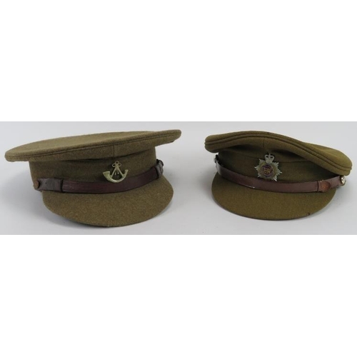 67 - Militaria: Two British army officers peaked caps, 20th century. (2 items).
Condition report: Some ag... 