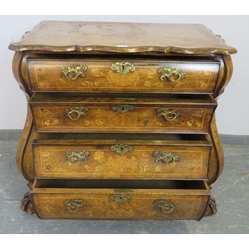 708 - An antique 18th century style Dutch walnut bombe-shaped chest, profusely decorated with marquetry in... 