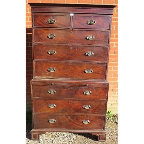 711 - A George III flame mahogany chest on chest, the upper section with two short over three long graduat... 