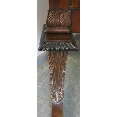 712 - A large turn of the century mahogany cheval mirror, on acanthus carved curved supports with gadroone... 