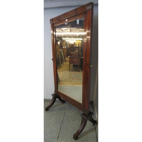 712 - A large turn of the century mahogany cheval mirror, on acanthus carved curved supports with gadroone... 