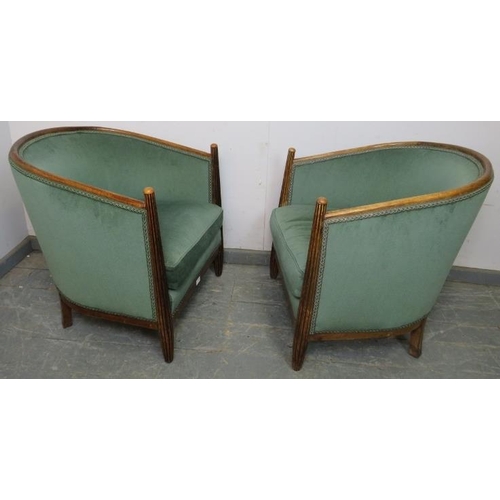 714 - A pair of French Art Deco Period tub chairs, the tapered fluted front supports with domed finials, r... 