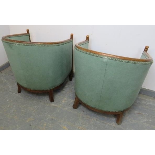 714 - A pair of French Art Deco Period tub chairs, the tapered fluted front supports with domed finials, r... 