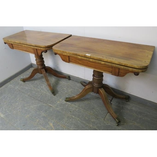 721 - A pair good Regency Period mahogany turn over tea tables, on baluster turned pedestals with reeded s... 