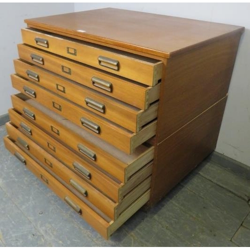 722 - A mid-century teak planning chest of usable proportions, having eight long drawers with brass scallo... 