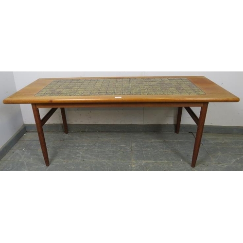 737 - A mid-century Danish teak rectangular coffee table, the top with inset green tiles, on turned suppor... 