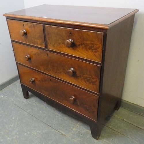 738 - A 19th century flame mahogany chest of two short over two long graduated drawers with turned wooden ... 