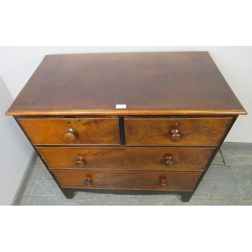 738 - A 19th century flame mahogany chest of two short over two long graduated drawers with turned wooden ... 