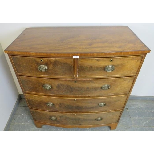 744 - A Georgian mahogany bow-fronted chest, housing two short over three long graduated cock-beaded drawe... 