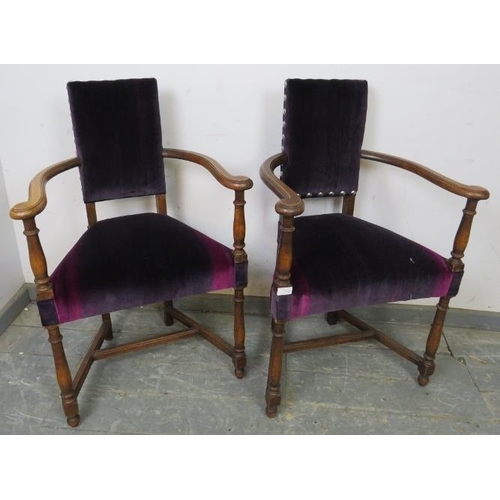 746 - A pair of antique Continental fruitwood elbow chairs, reupholstered in rich purple velvet with boss ... 