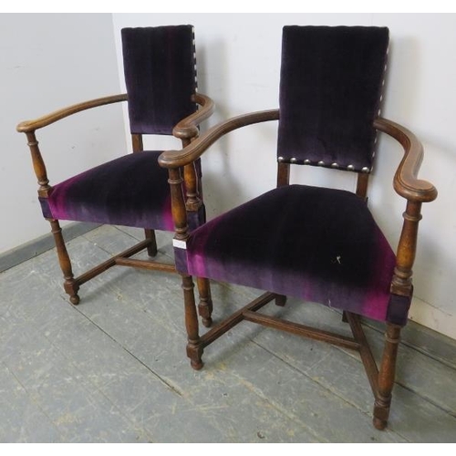 746 - A pair of antique Continental fruitwood elbow chairs, reupholstered in rich purple velvet with boss ... 