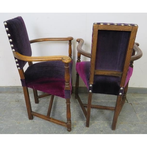 746 - A pair of antique Continental fruitwood elbow chairs, reupholstered in rich purple velvet with boss ... 