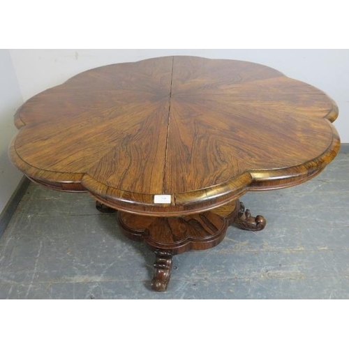 750 - A Victorian rosewood tilt-top breakfast table, the top with lobed edge, on a bulbous octagonal pedes... 