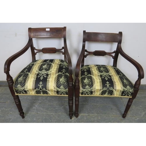 752 - A matched pair of Georgian mahogany elbow chairs, reupholstered in green and gold antique style mate... 