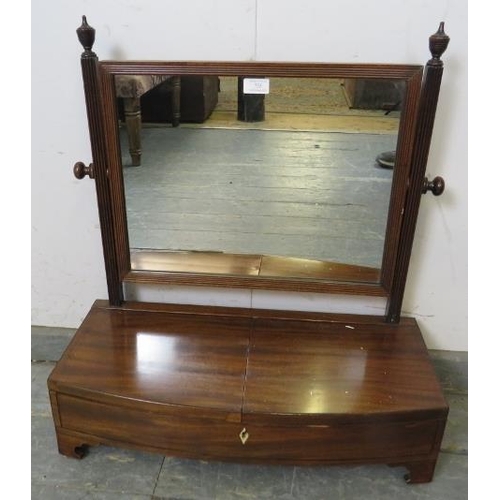 755 - A Regency Period mahogany gentlemen’s swing vanity mirror, the reeded uprights with turned finials, ... 