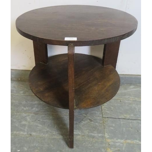 766 - An Art Deco Period oak two-tier occasional table, on curved tripod supports. 
H64cm D56cm (approx).
... 