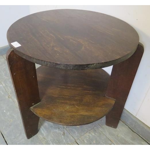 766 - An Art Deco Period oak two-tier occasional table, on curved tripod supports. 
H64cm D56cm (approx).
... 