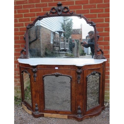 770 - A Victorian mahogany mirror backed chiffonier, having acanthus carved and pierced surround, above a ... 