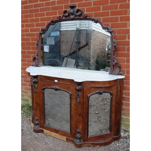 770 - A Victorian mahogany mirror backed chiffonier, having acanthus carved and pierced surround, above a ... 