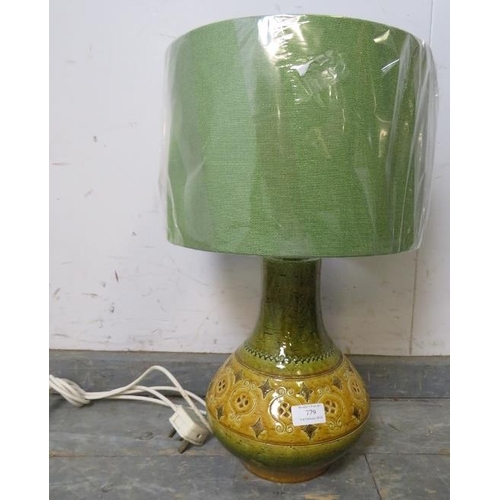 779 - A vintage mid-century Italian ceramic table lamp of baluster form, having incised decoration, finish... 