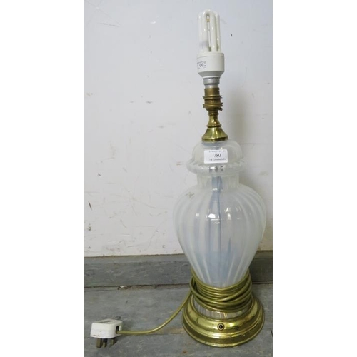 780 - A vintage opalescent Vaseline glass table lamp with fluted decoration, on a brass plinth base.
H45cm... 