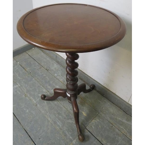 781 - Early Victorian mahogany circular wine table, the dished top on a barley twist column with scrolled ... 