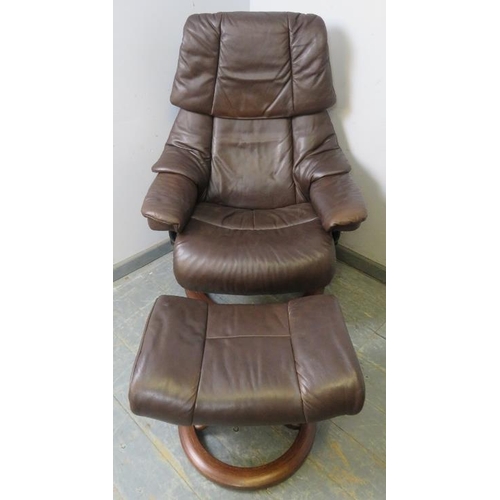 783 - A ‘stressless’ reclining lounge chair by Ekornes, upholstered in soft brown leather, with adjustable... 